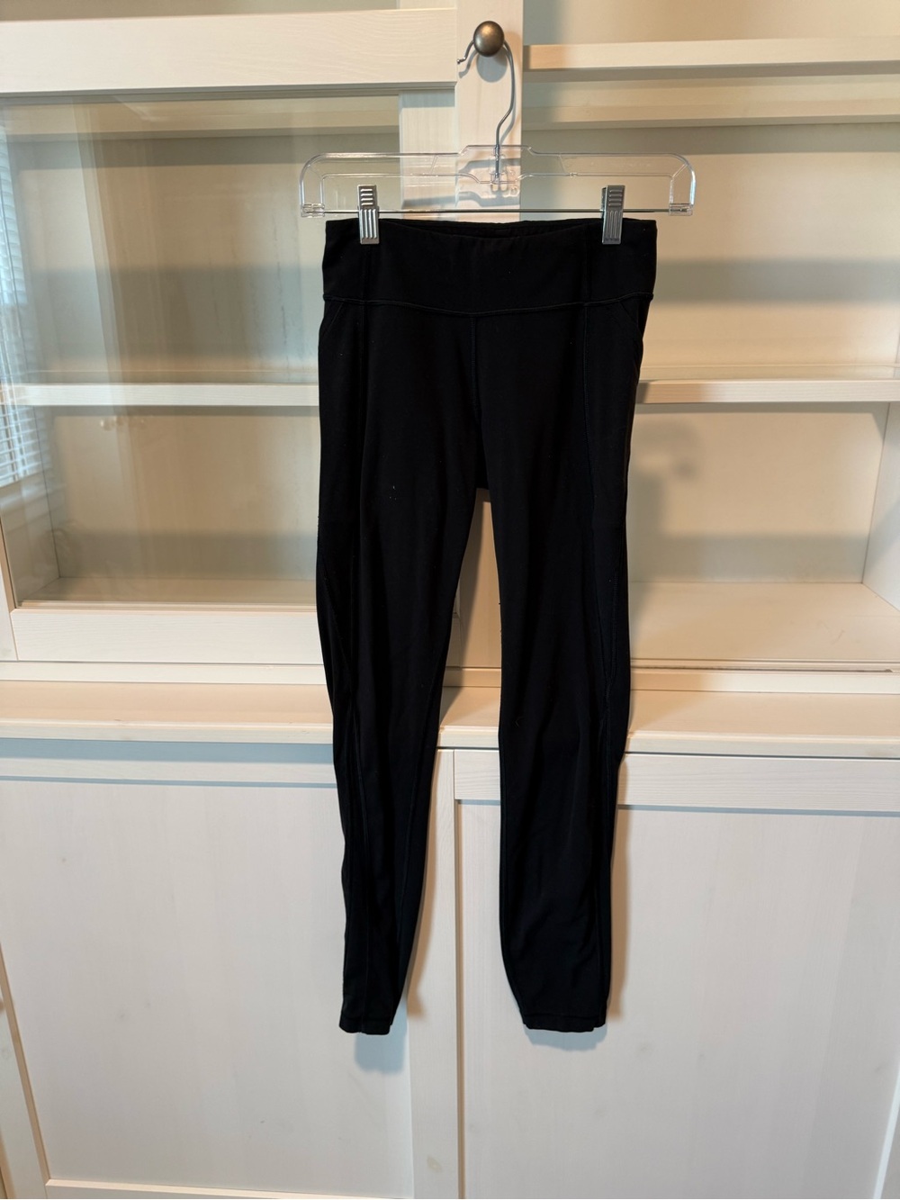 Athleta Girl black leggings, pockets